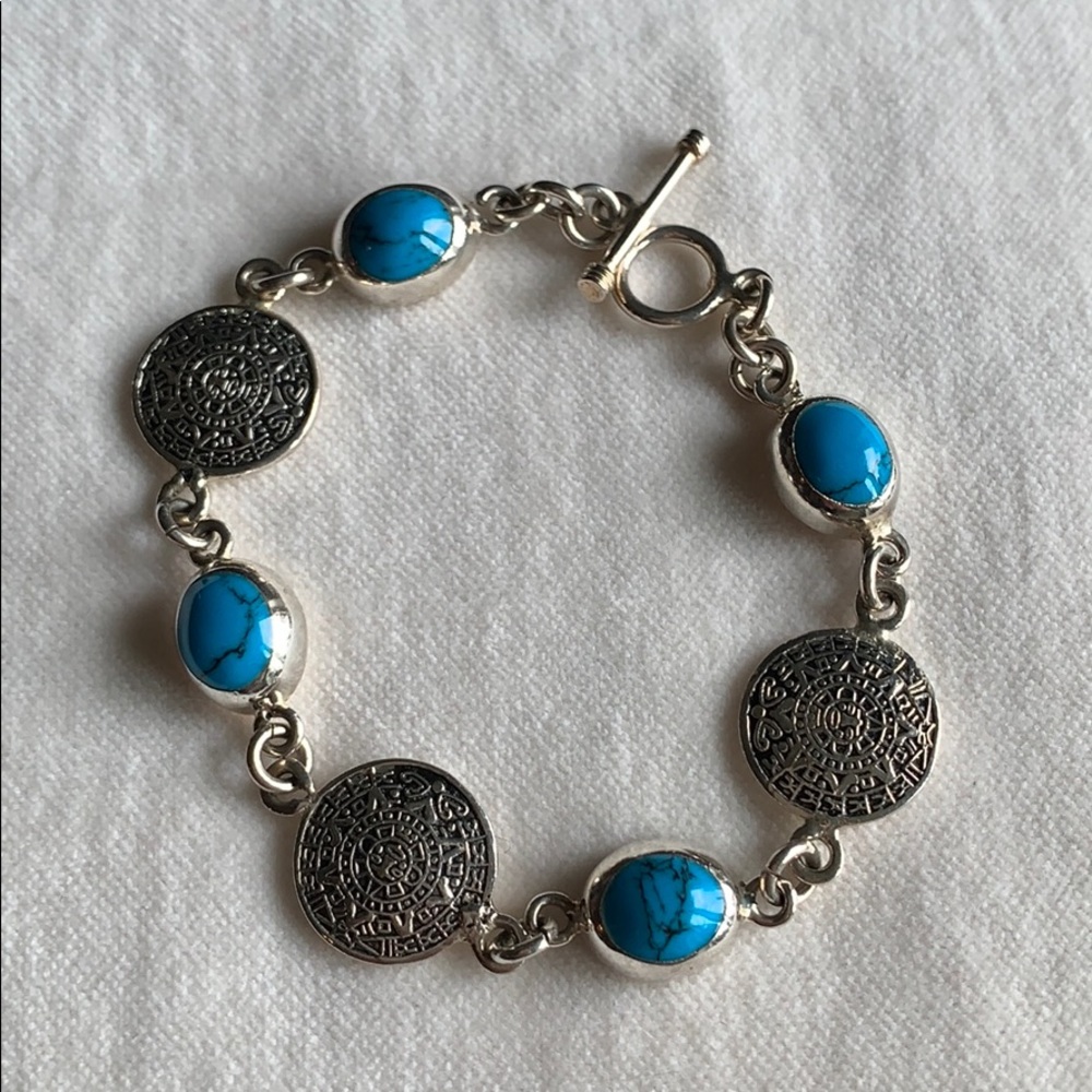 Sterling Silver Bracelet with Turquoise stones!